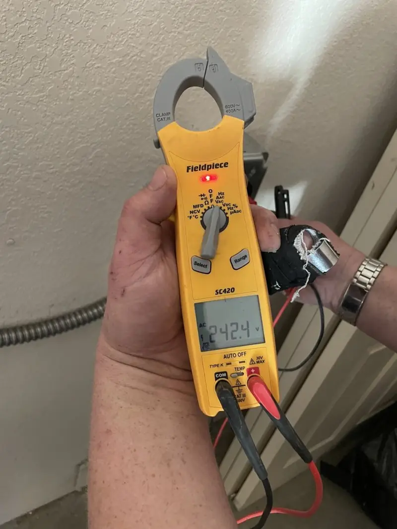 Voltage testing with clamp meter during Circuit Breaker Repair in Prospect Heights